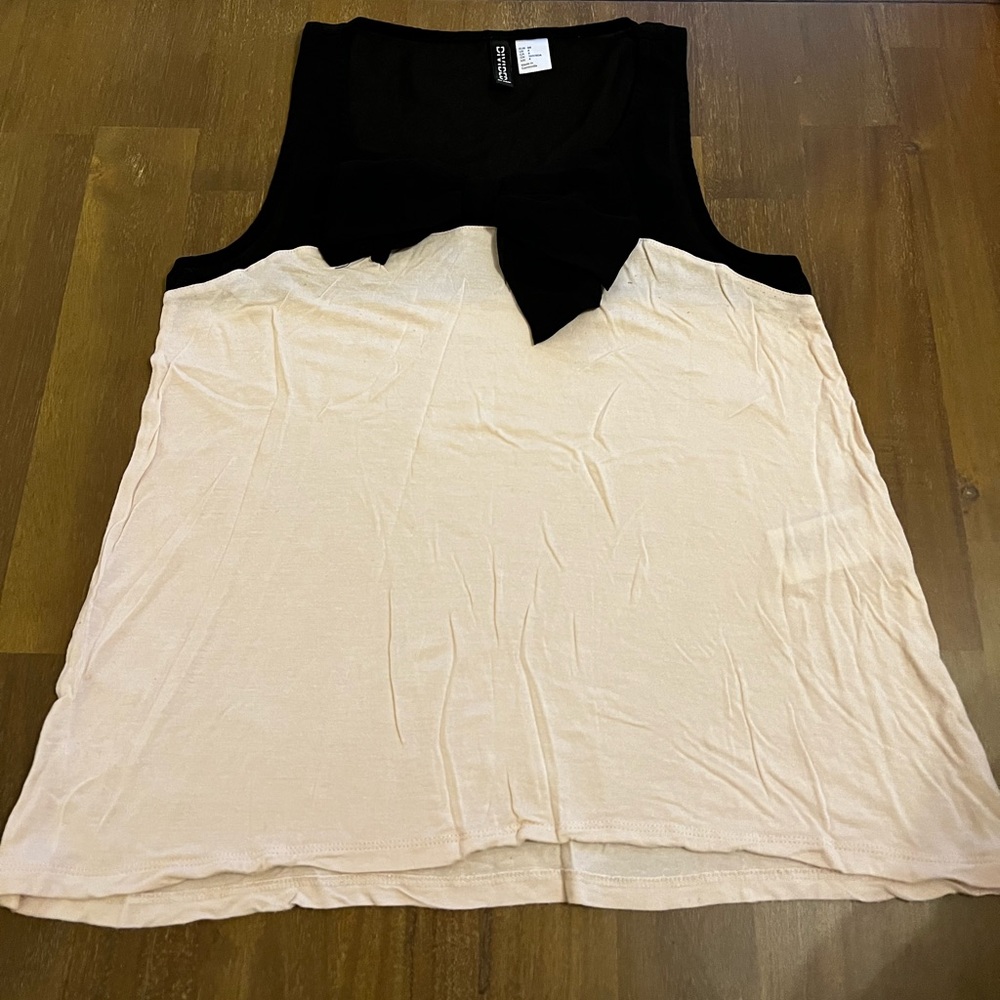 Cream top with black bow tie